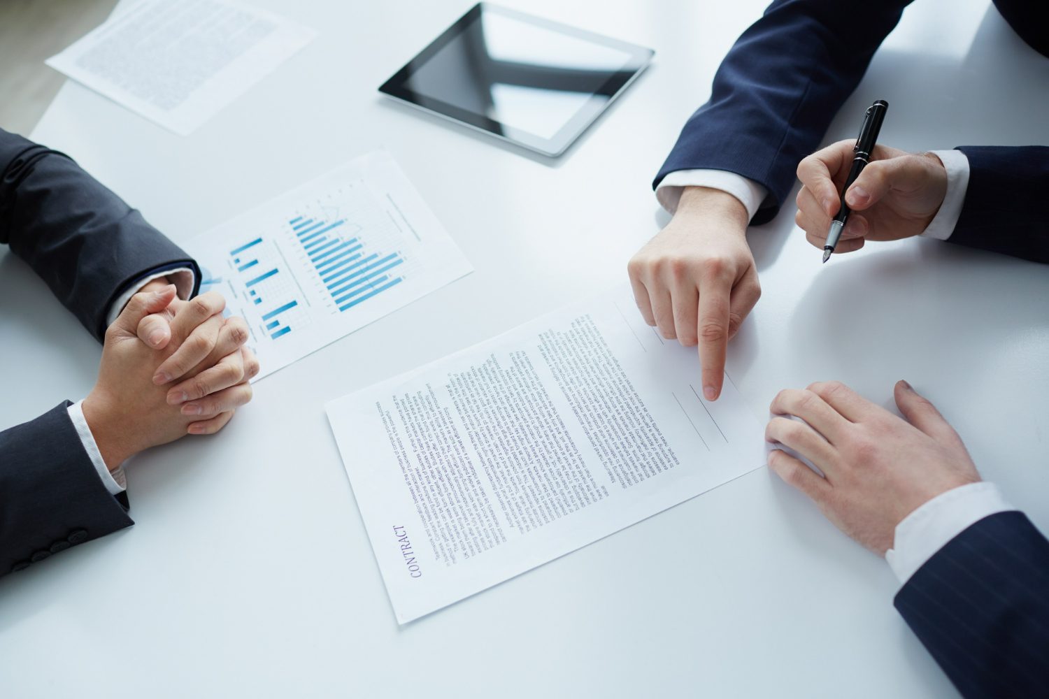 top-view-businessman-signing-documents